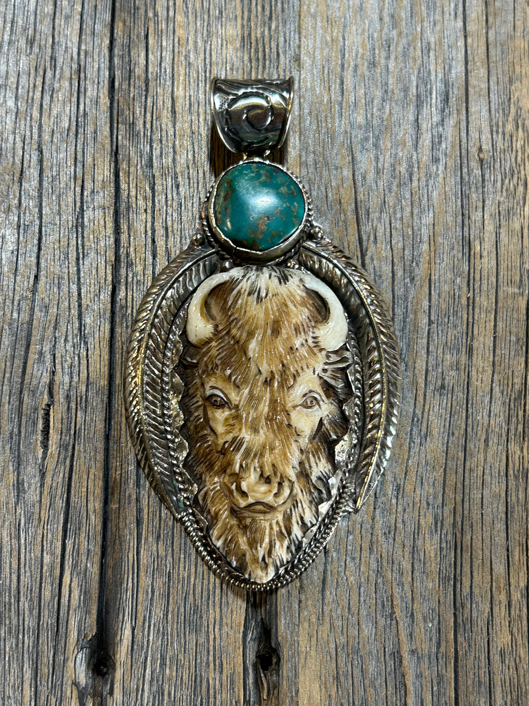 CARVED BONE BUFFALO PENDANT