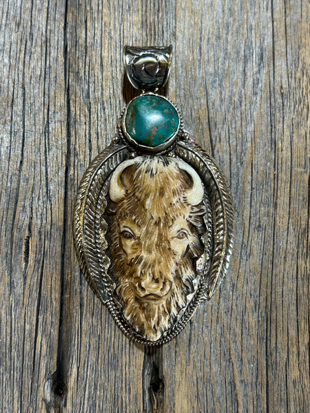 CARVED BONE BUFFALO PENDANT