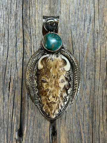 CARVED BONE BUFFALO PENDANT