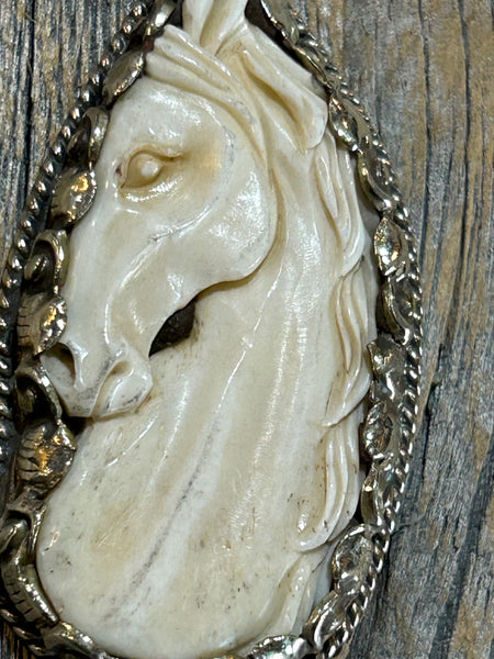 CARVED BONE HORSE PENDANT