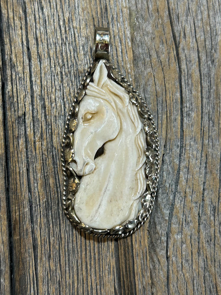 CARVED BONE HORSE PENDANT